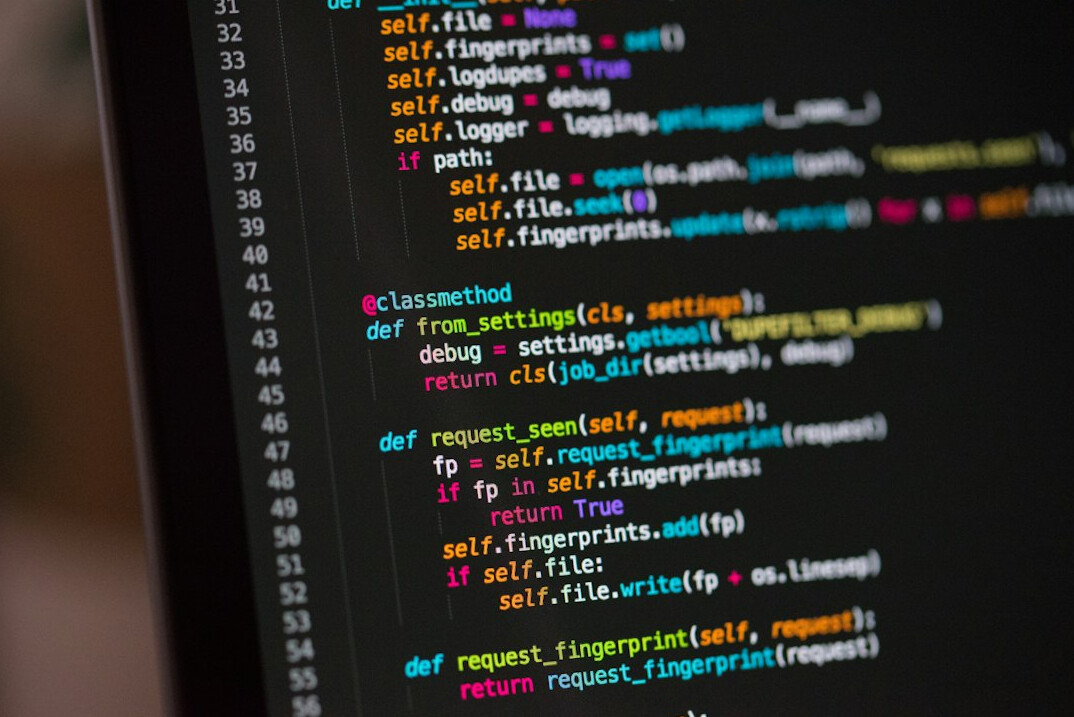 young programmer at desk